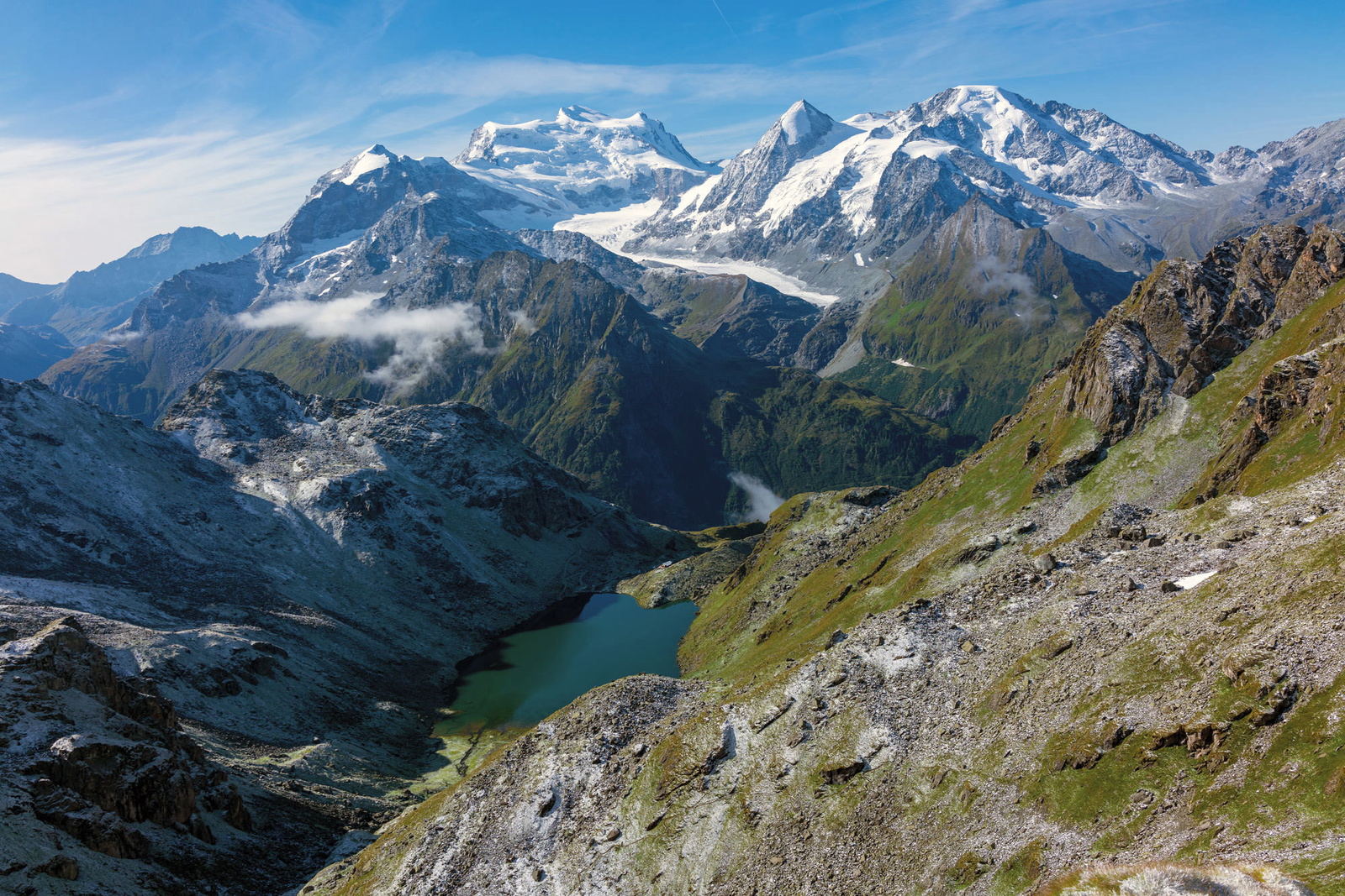 View of the Combin with Cabane de Louvie far below by the lake