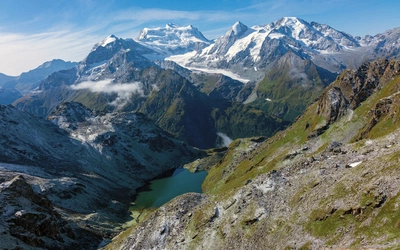 View of the Combin with Cabane de Louvie far below by the lake