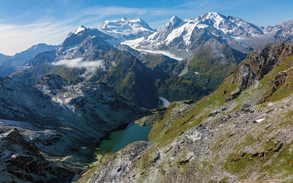 View of the Combin with Cabane de Louvie far below by the lake