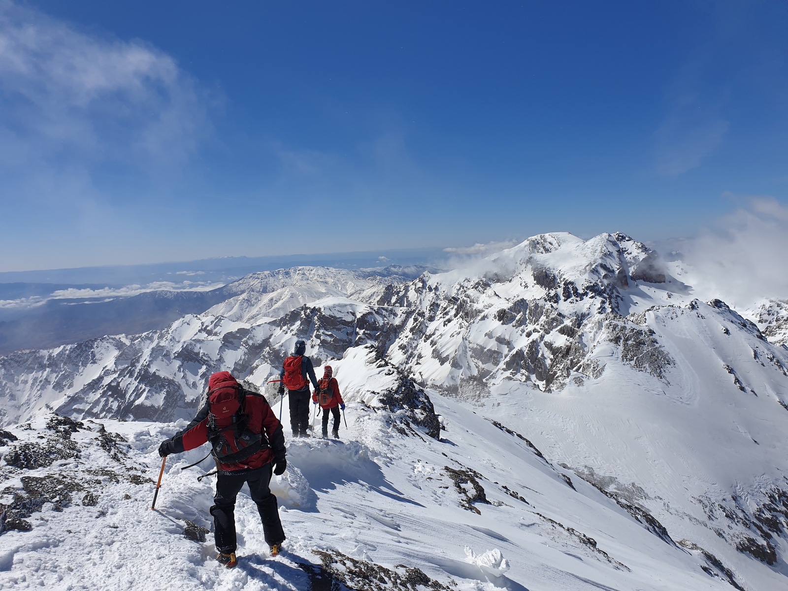 Descending Toubkal's ridge back towards Tizi n’Toubkal