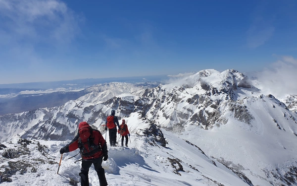 Descending Toubkal's ridge back towards Tizi n’Toubkal