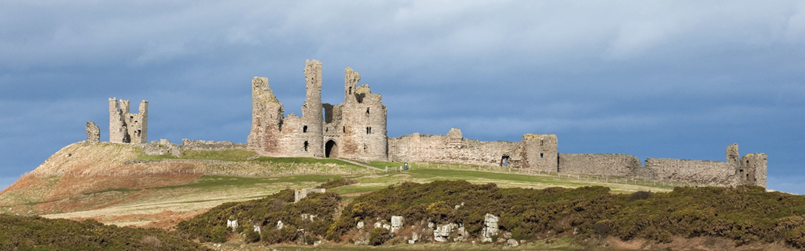 The spectacular ruins of Dunstanburgh Castle, St Oswald's Way