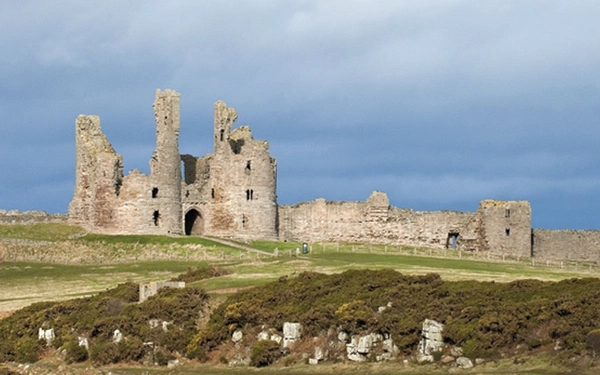 The spectacular ruins of Dunstanburgh Castle, St Oswald's Way