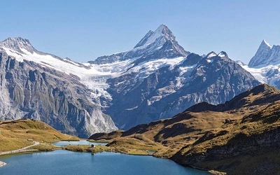 The beautiful Bachsee with the Wetterhorn, Schreckhorn and Fiescherhorn behind
