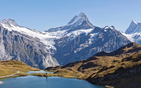 The beautiful Bachsee with the Wetterhorn, Schreckhorn and Fiescherhorn behind