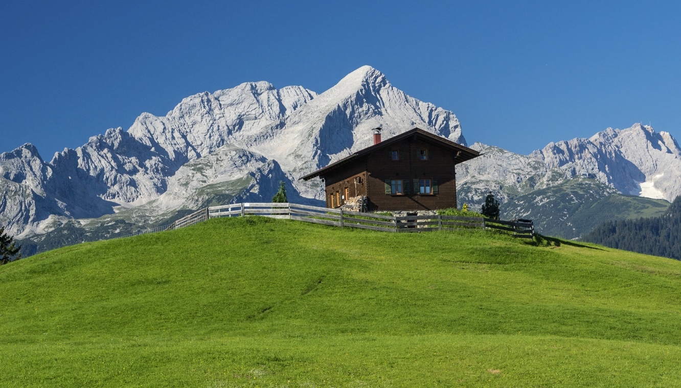 The Zugspitze massif forms an impressive backdrop on the way to Gasthof Eckbauer