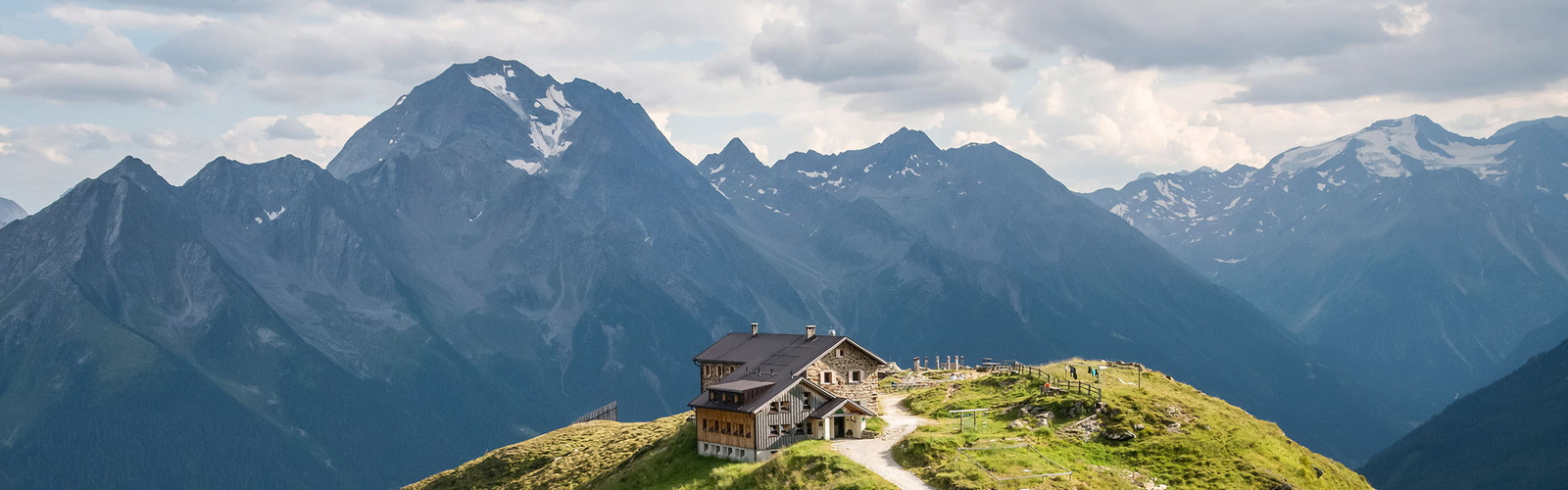 Alpine peaks and hut in the Austrian mountains