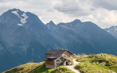 Alpine peaks and hut in the Austrian mountains