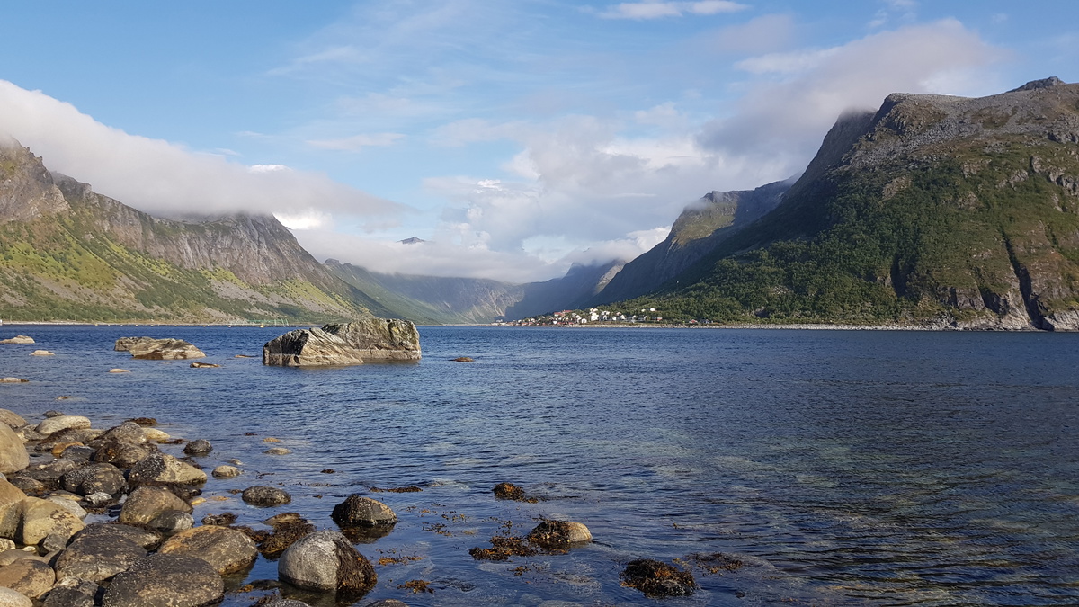 Gryllefjord surrounded by steep mountains and sheltered from the westerly winds